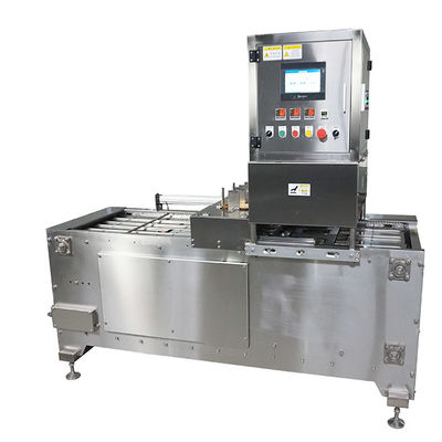 Automatische verzegeling van tafelbakken 10-20 bakken/min.