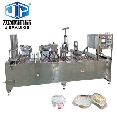 Automatische Oat Cap Measuring Cup Quantitative Filling Sealing Machine met lepelvoeding
